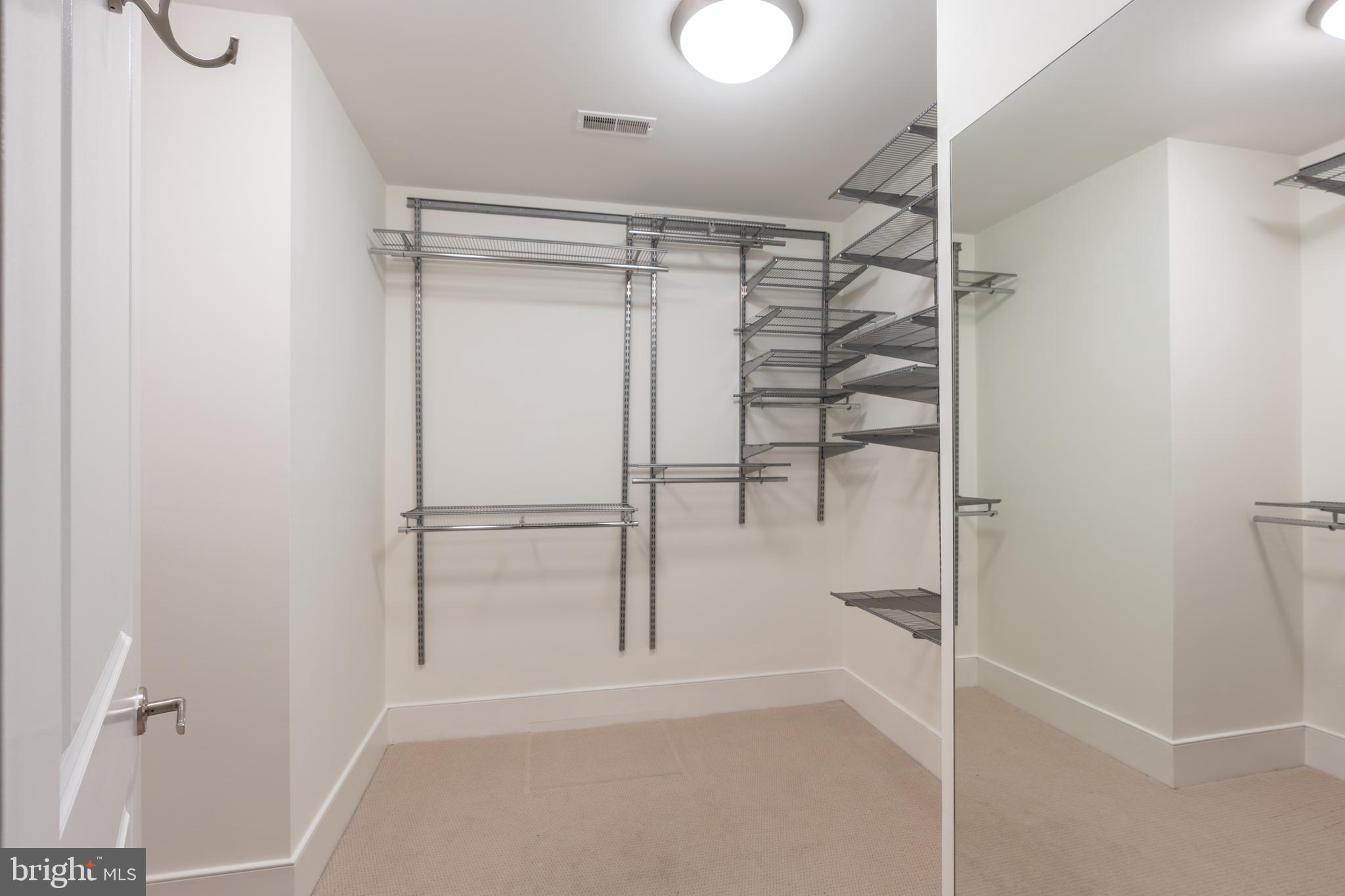 4301 Military Road Northwest, Unit 703 Washington, DC 20015 - Photo 13 of 38 Owners Custom Closet is easy to re-configure!