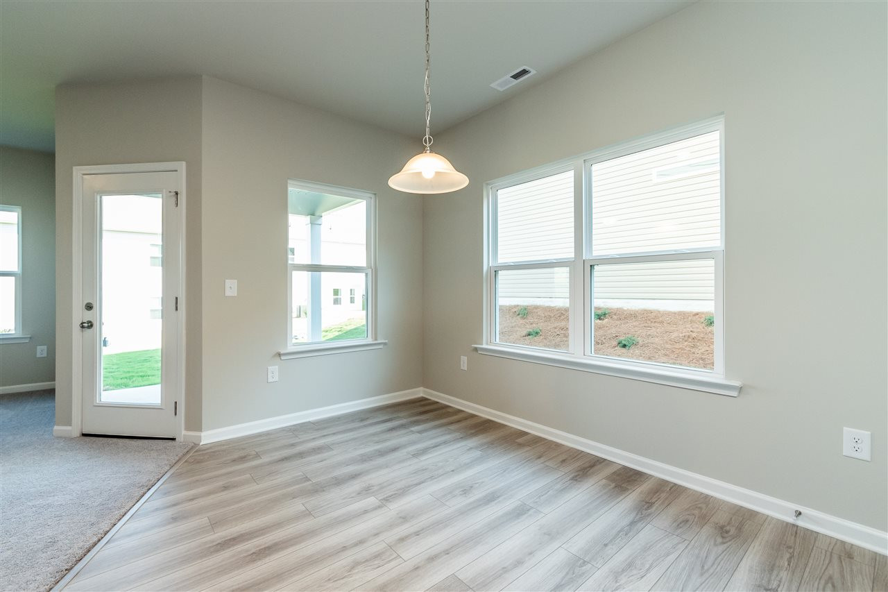6818 Resting Grove Road, Unit 108 Raleigh, NC 27610 - Photo 12 of 24 A representative photo of a Braselton plan already built for demonstration purposes. New construction is under way. Breakfast Area