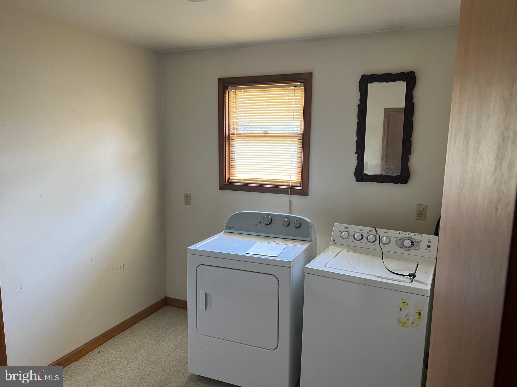 303 Grant Road Adamstown, PA 17569 - Photo 6 of 13 a utility room with dryer and washer