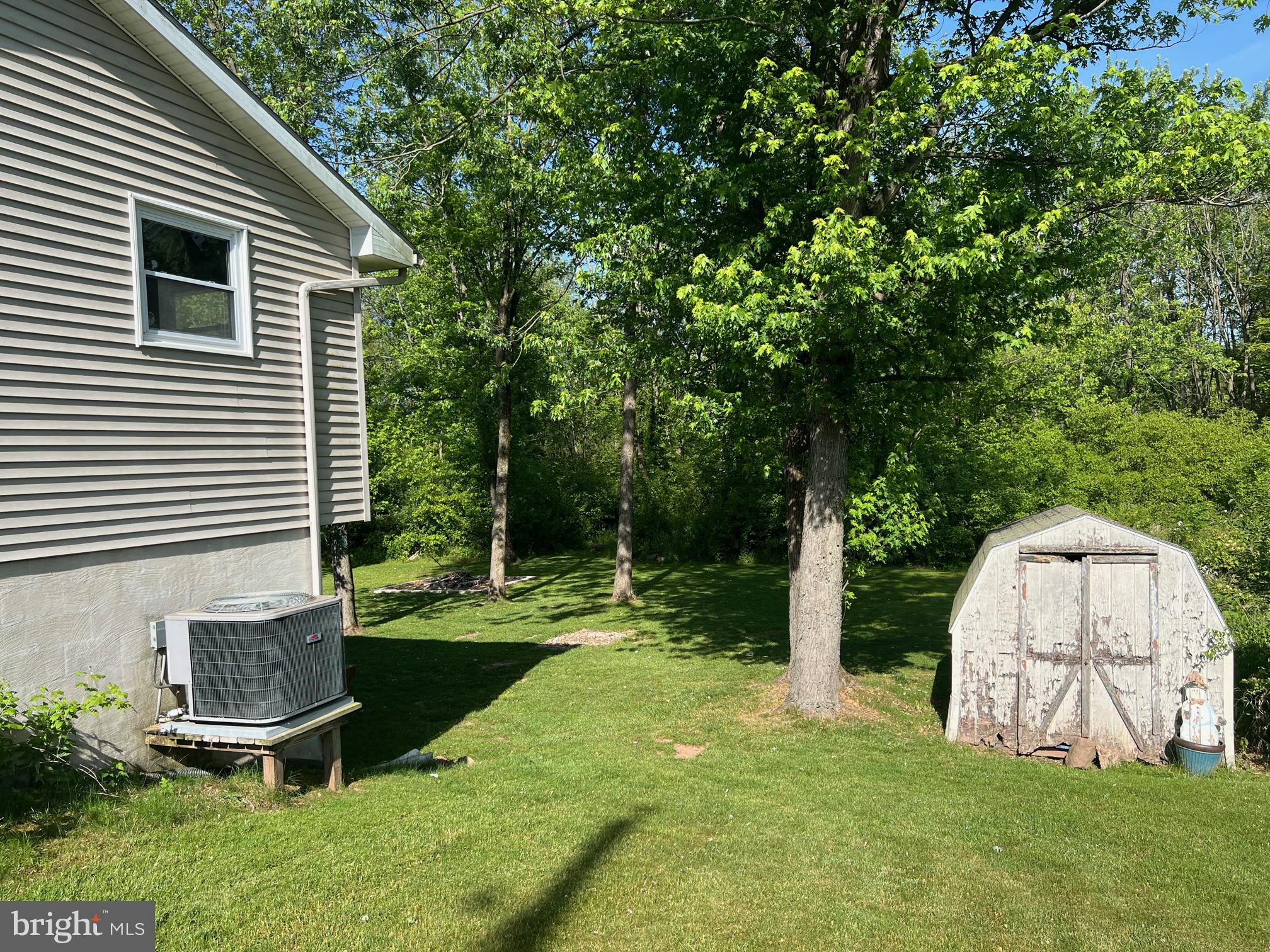 303 Grant Road Adamstown, PA 17569 - Photo 9 of 13 a view of backyard with a garden and entertaining space