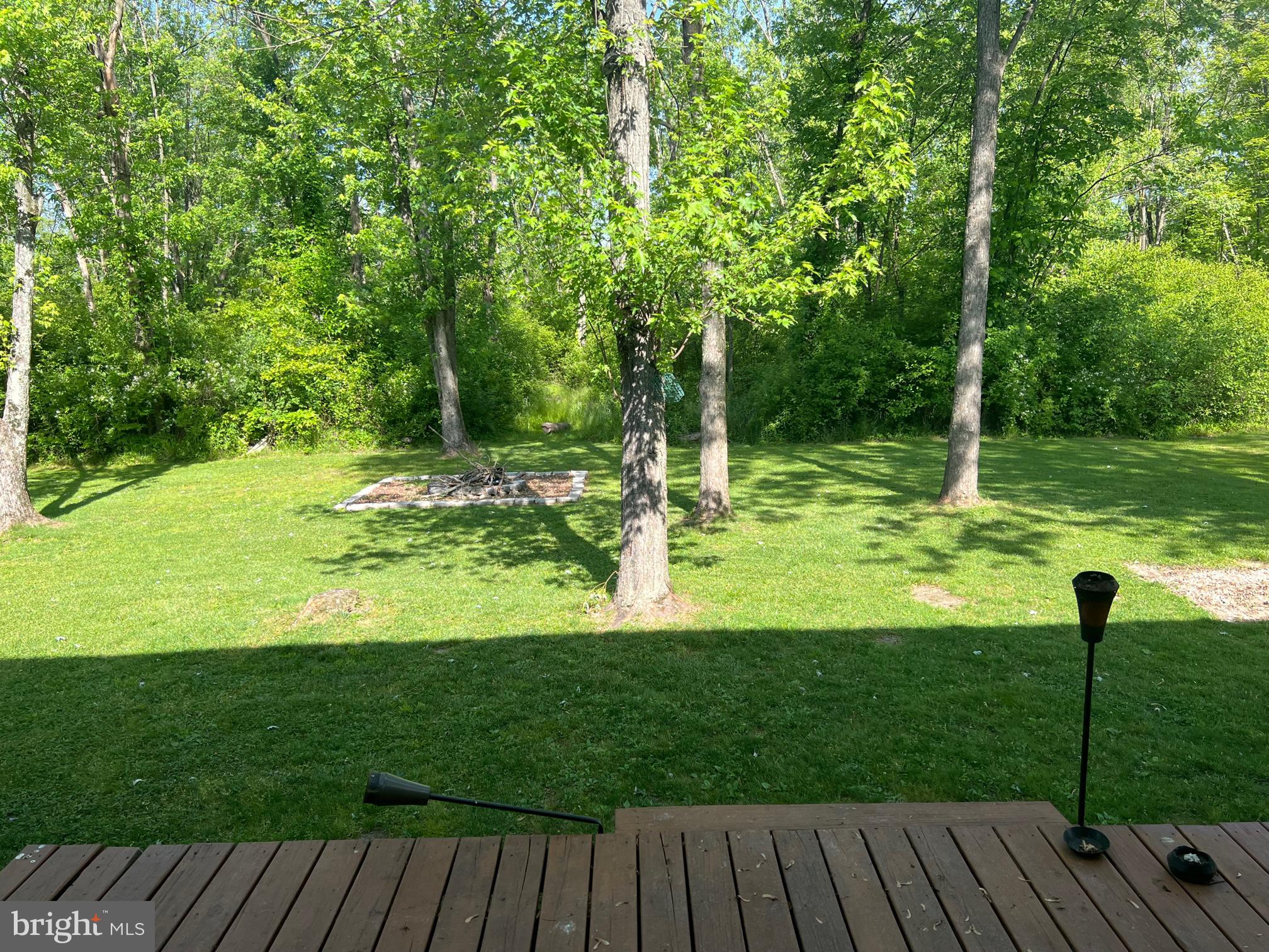 303 Grant Road Adamstown, PA 17569 - Photo 10 of 13 a view of a wooden deck and a yard