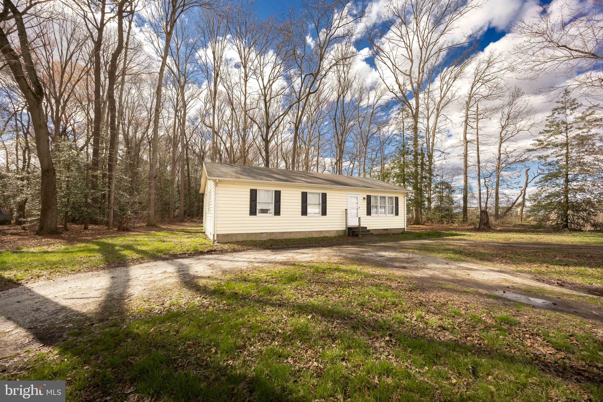 6870 Zion Church Road Salisbury, MD 21804 - Photo 3 of 39 a view of a house with a yard and sitting area