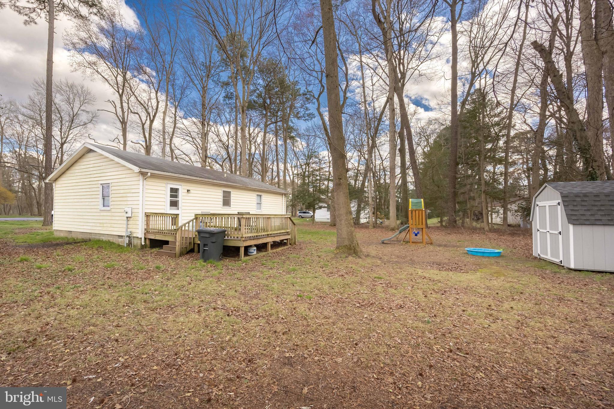 6870 Zion Church Road Salisbury, MD 21804 - Photo 39 of 39 a view of a house with a yard and trees