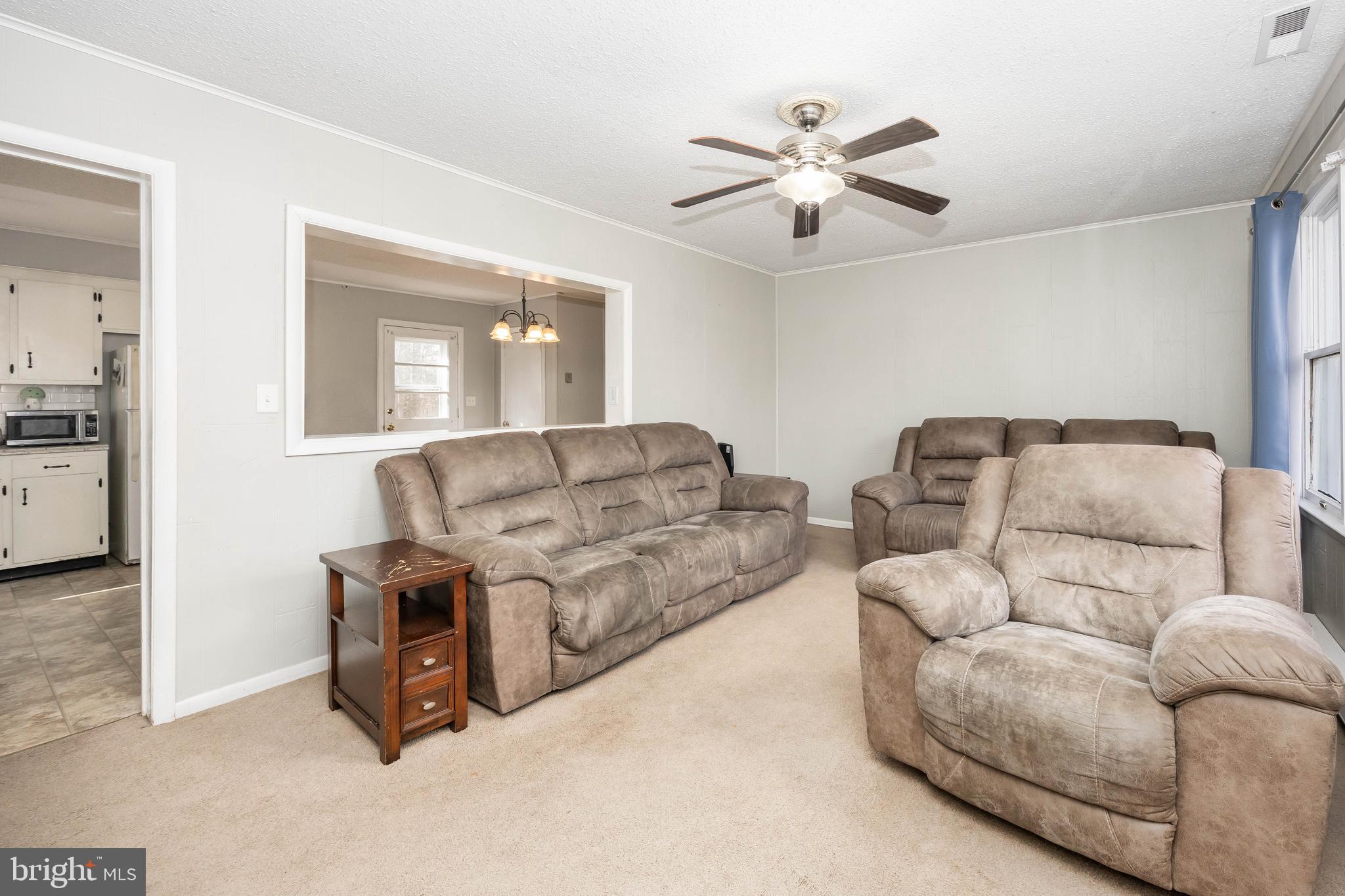 6870 Zion Church Road Salisbury, MD 21804 - Photo 8 of 39 a living room with furniture and white walls