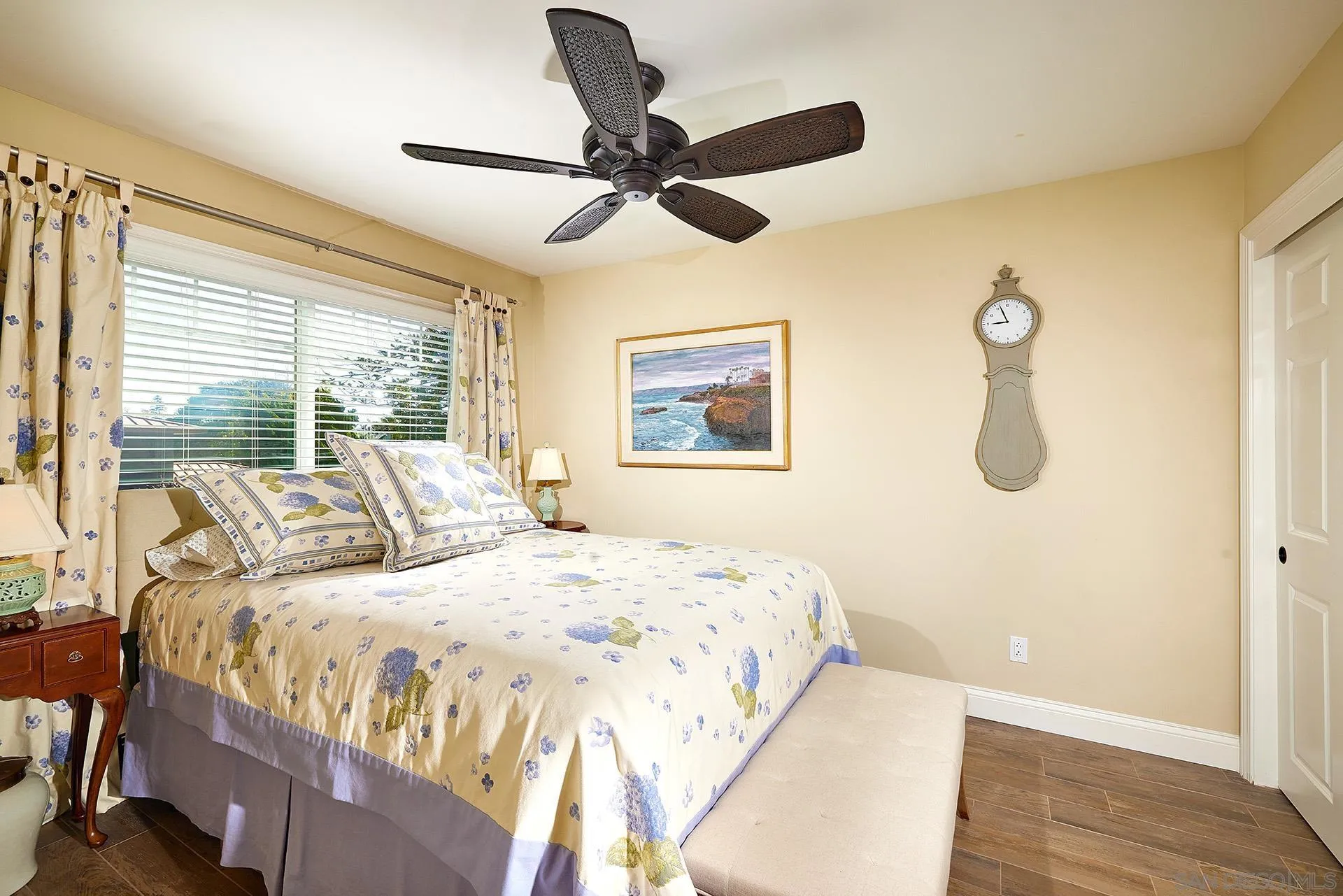 744 Cornish Drive Encinitas, CA 92024 - Photo 22 of 39 a bedroom with a bed and window