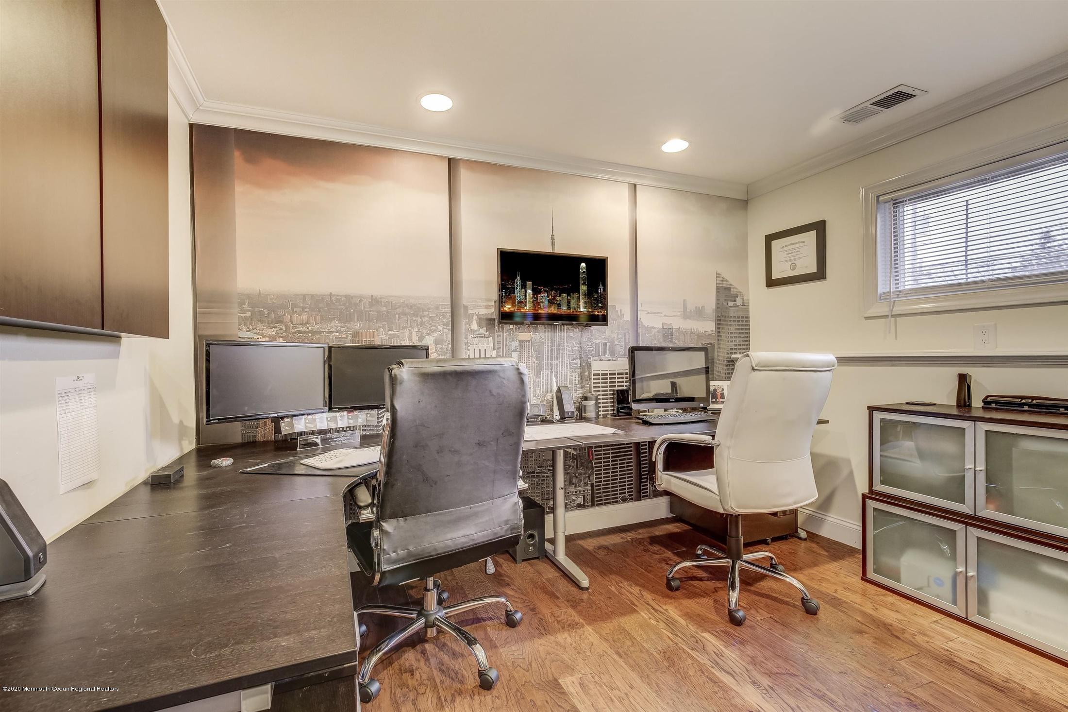 4 Wickatunk Road Manalapan, NJ 07726 - Photo 20 of 23 a workspace with furniture hardwood and a kitchen