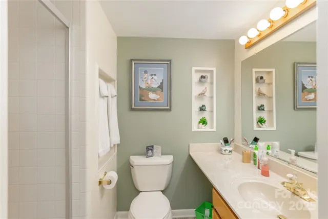 a view of a chair and table in the balcony