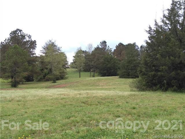 Vac Vac Plank Road Norwood, NC 28128 - Photo 4 of 4 a view of a field with trees in the background