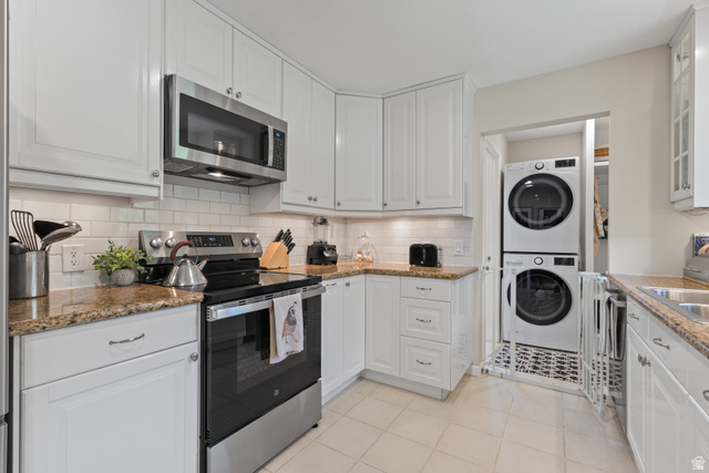 3320 Cherokee Lane Provo, UT 84604 - Photo 13 of 52 Kitchen featuring white shaker-style cabinetry, granite countertops, and a white subway tile backsplash