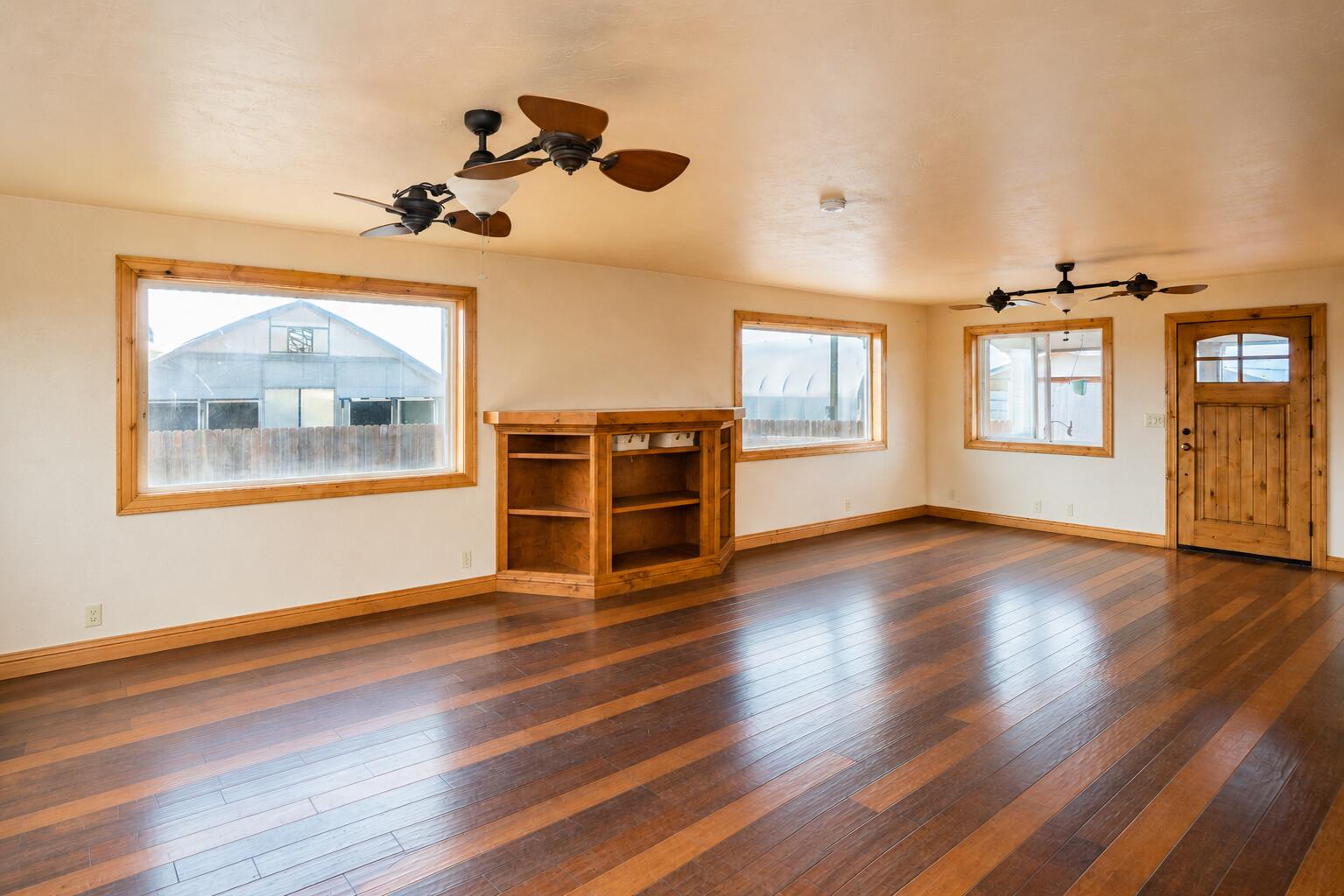 26695 Horsell Road Bend, OR 97701 - Photo 15 of 33 a view of empty room with wooden floor and fan