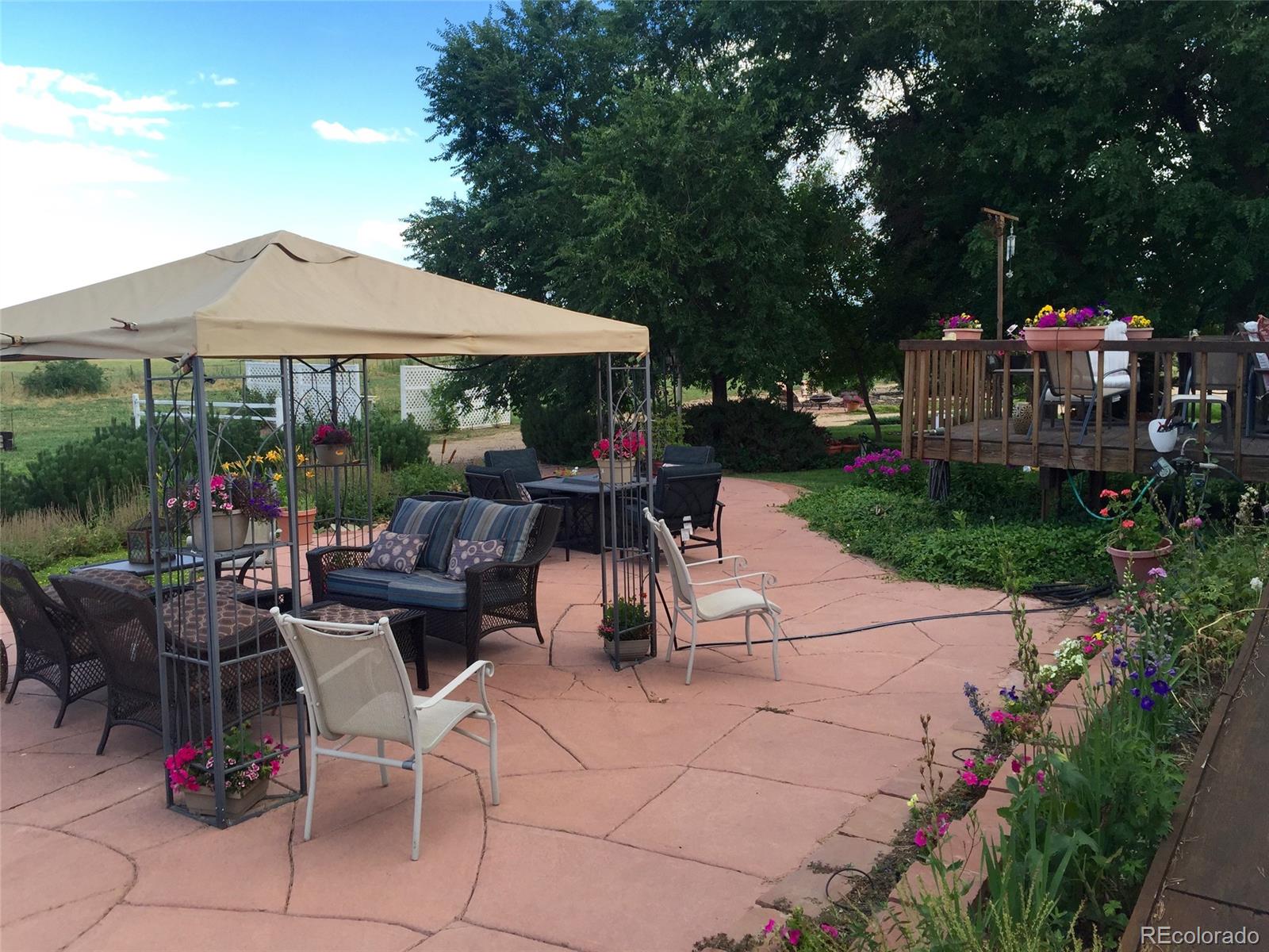 9774 Phillips Road Lafayette, CO 80026 - Photo 5 of 27 a view of outdoor space yard and patio