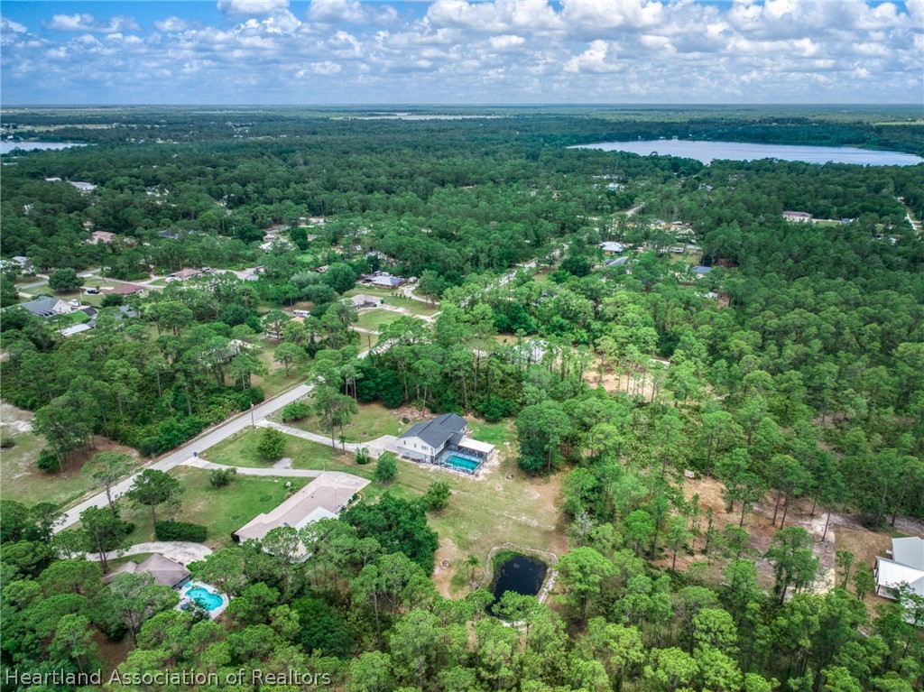 5731 Wolf Lake Road Sebring, FL 33875 - Photo 45 of 45 an aerial view of residential house with outdoor space