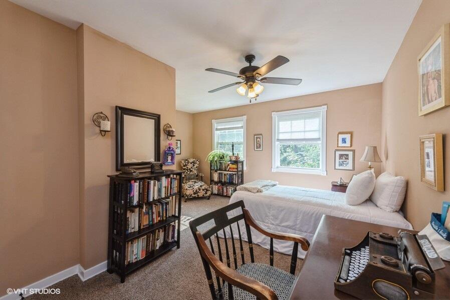 1695 Indian Boundary Road Chesterton, IN 46304 - Photo 18 of 29 a living room with furniture a flat screen tv and a window
