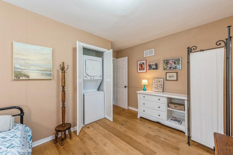 1695 Indian Boundary Road Chesterton, IN 46304 - Photo 22 of 29 a room with a bed and a dresser