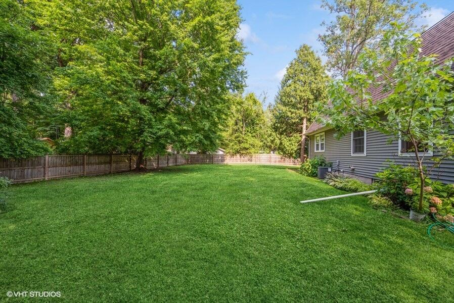 1695 Indian Boundary Road Chesterton, IN 46304 - Photo 29 of 29 a view of a yard with plants and a large tree