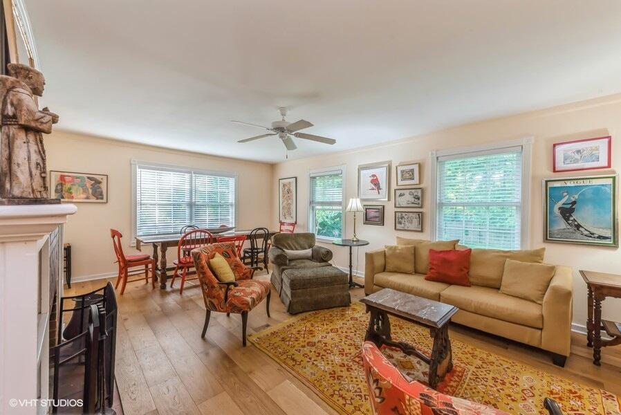 1695 Indian Boundary Road Chesterton, IN 46304 - Photo 9 of 29 a living room with furniture a fireplace and a large window