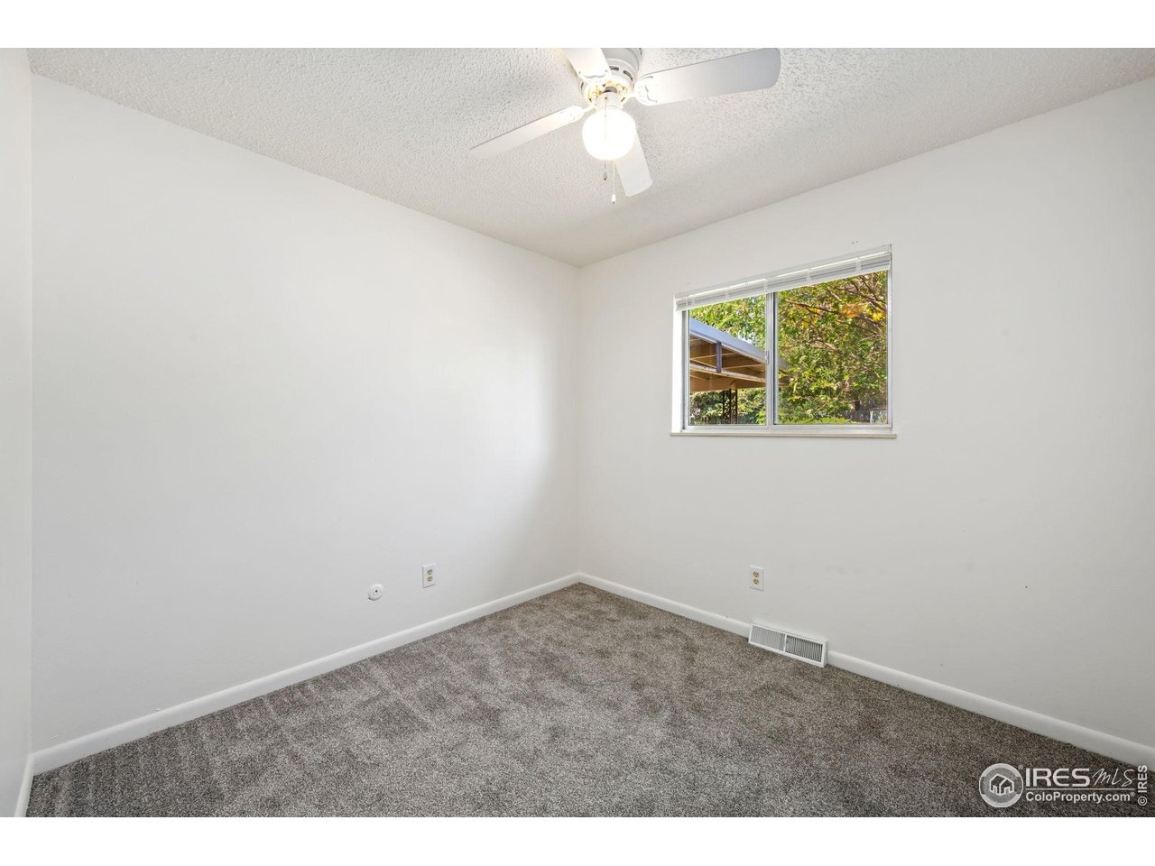 2717 West 26th Street Road Greeley, CO 80634 - Photo 11 of 25 Main floor bedroom 2
