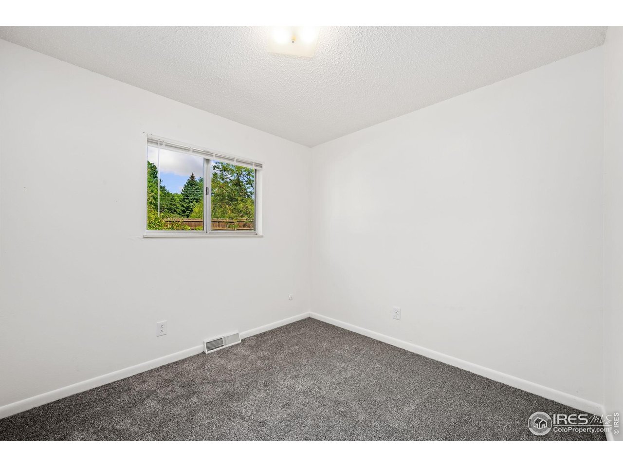 2717 West 26th Street Road Greeley, CO 80634 - Photo 12 of 25 Main floor bedroom 3