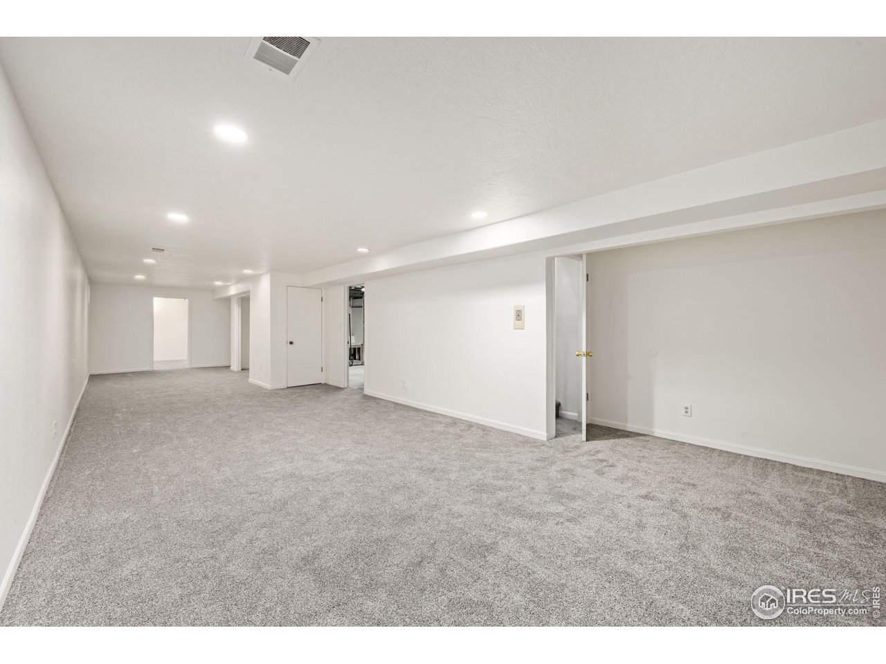 2717 West 26th Street Road Greeley, CO 80634 - Photo 14 of 25 Basement family room
