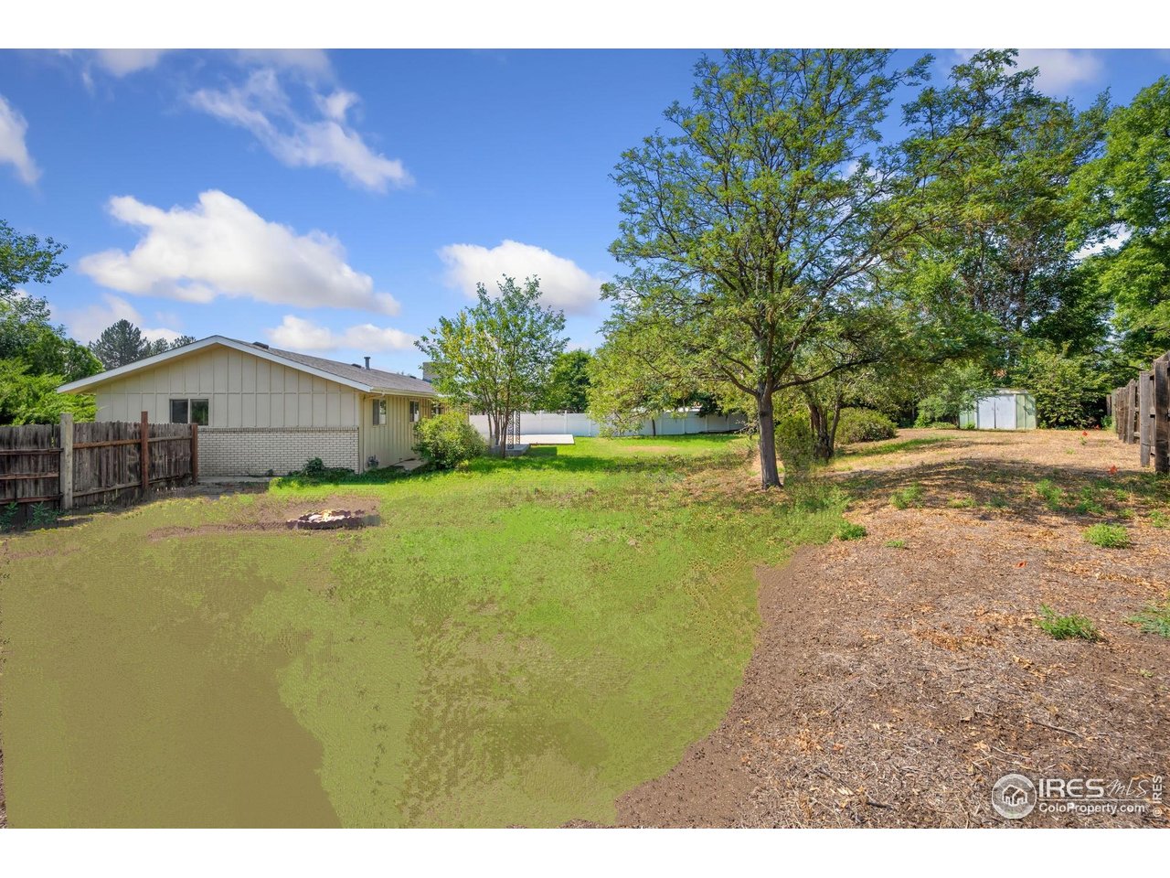 2717 West 26th Street Road Greeley, CO 80634 - Photo 23 of 25 View of HUGE yard from the NW corner of the yard