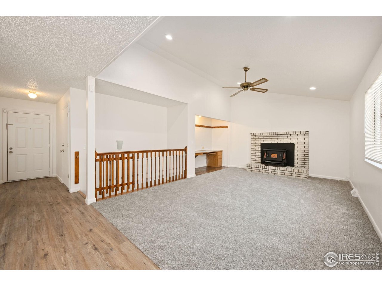 2717 West 26th Street Road Greeley, CO 80634 - Photo 3 of 25 Living Room with fireplace insert