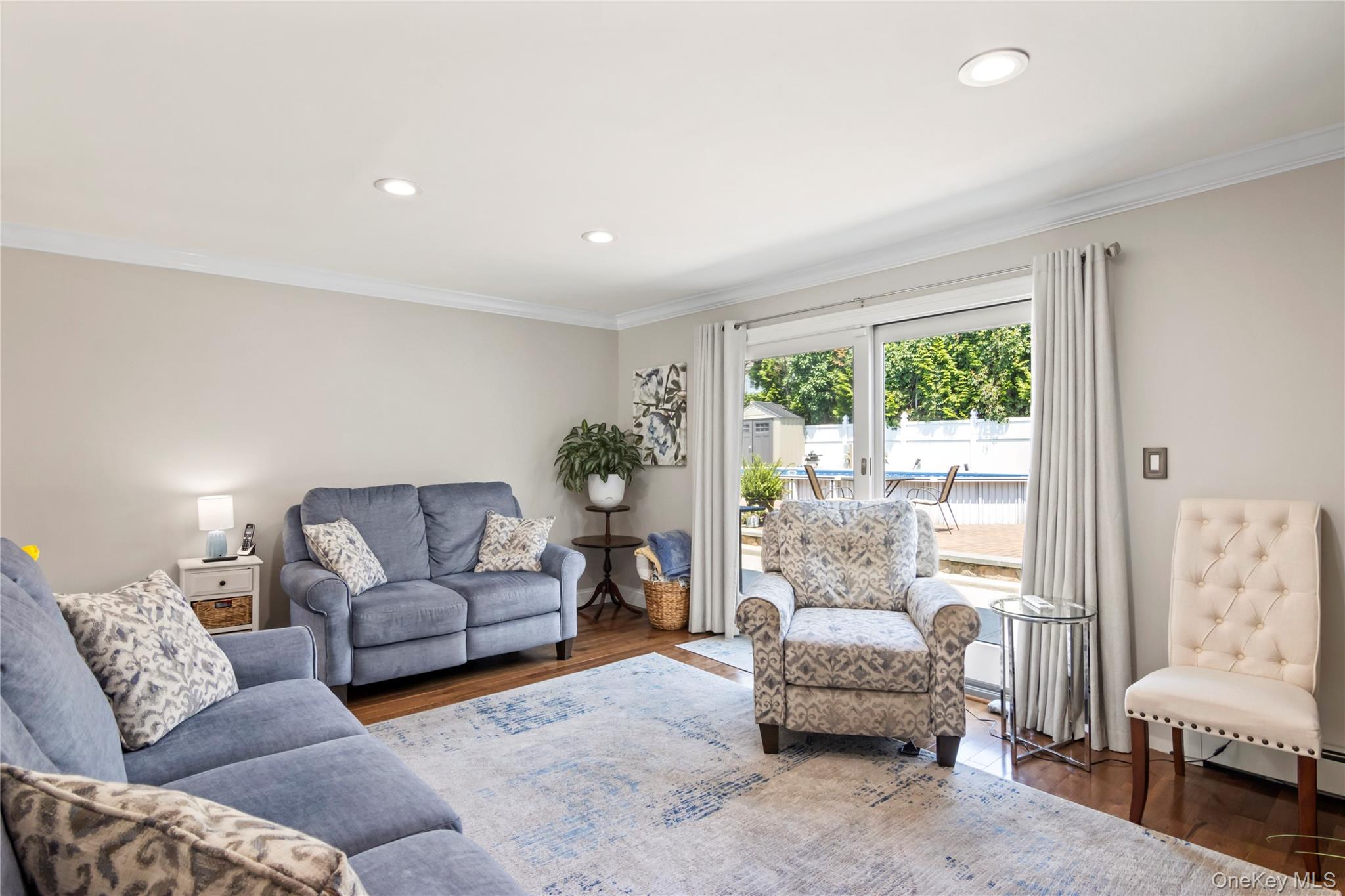 3483 Steven Road Baldwin, NY 11510 - Photo 14 of 30 a living room with furniture and a large window