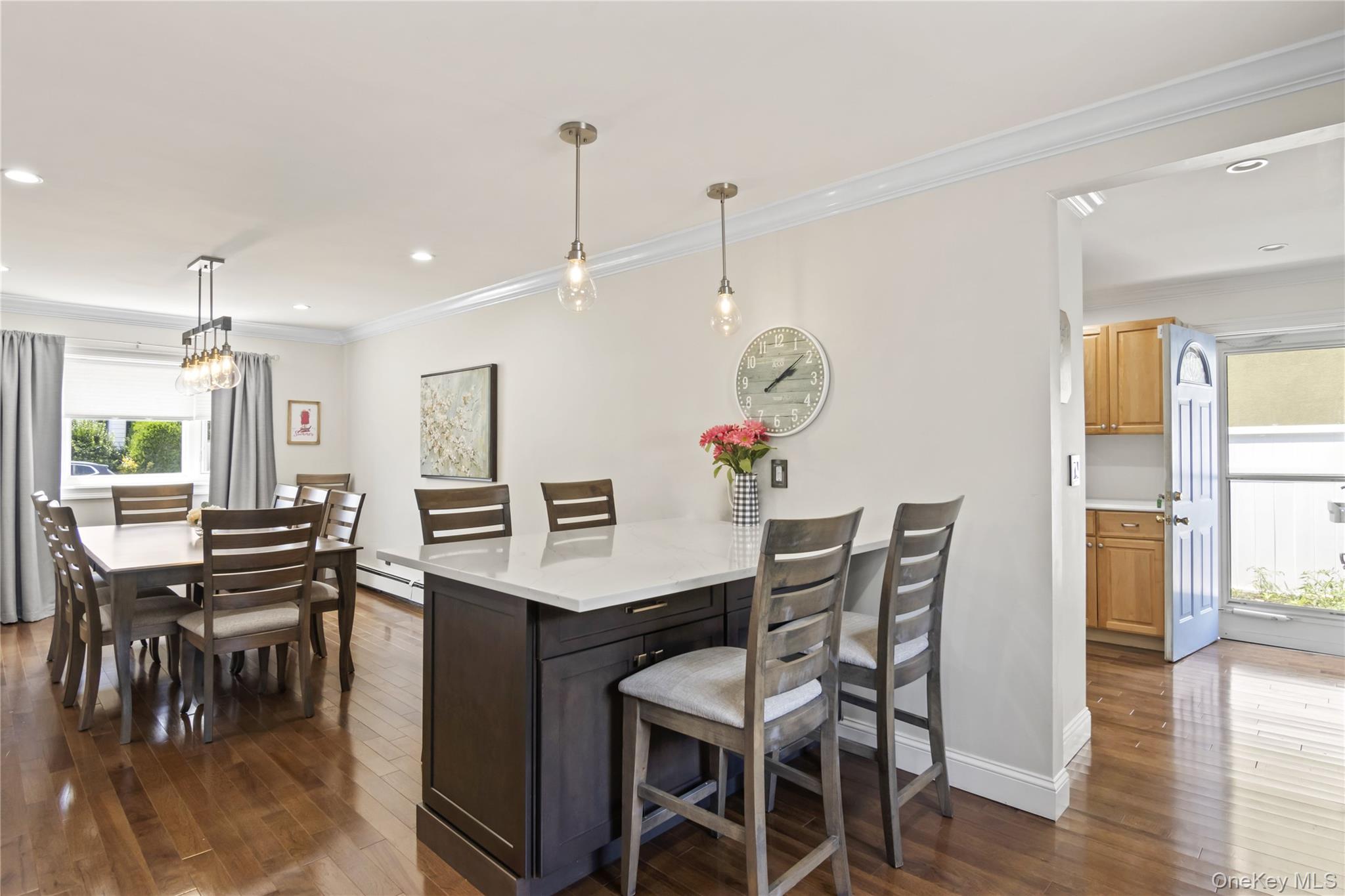 3483 Steven Road Baldwin, NY 11510 - Photo 5 of 30 a dining room with furniture and wooden floor