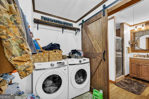 a bedroom with a bed and dresser