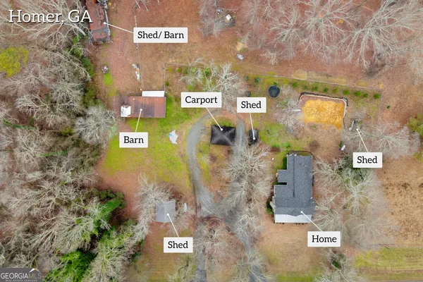 an aerial view of residential houses with outdoor space