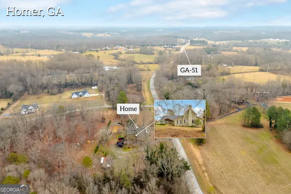 a view of swimming pool with trees