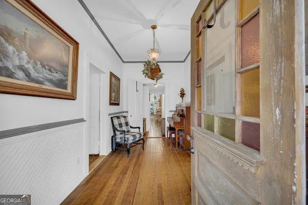 a living room with fireplace furniture and a flat screen tv