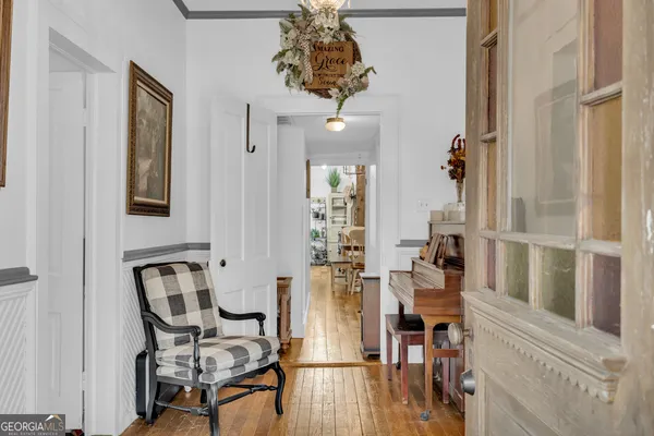 a bedroom with bed and cabinets
