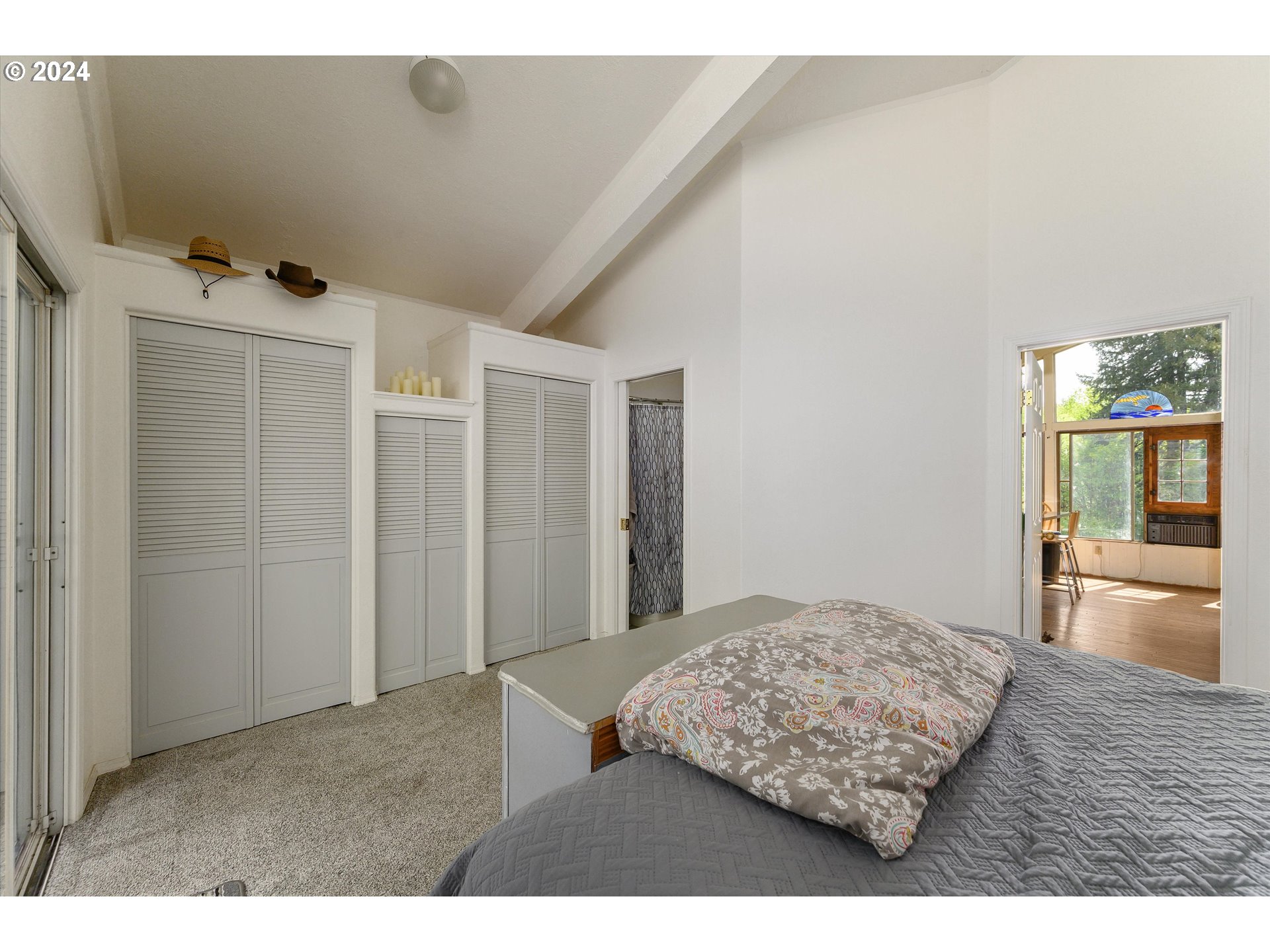 14885 Ferns Corner Road Dallas, OR 97338 - Photo 17 of 47 a bedroom with a bed and wooden floor
