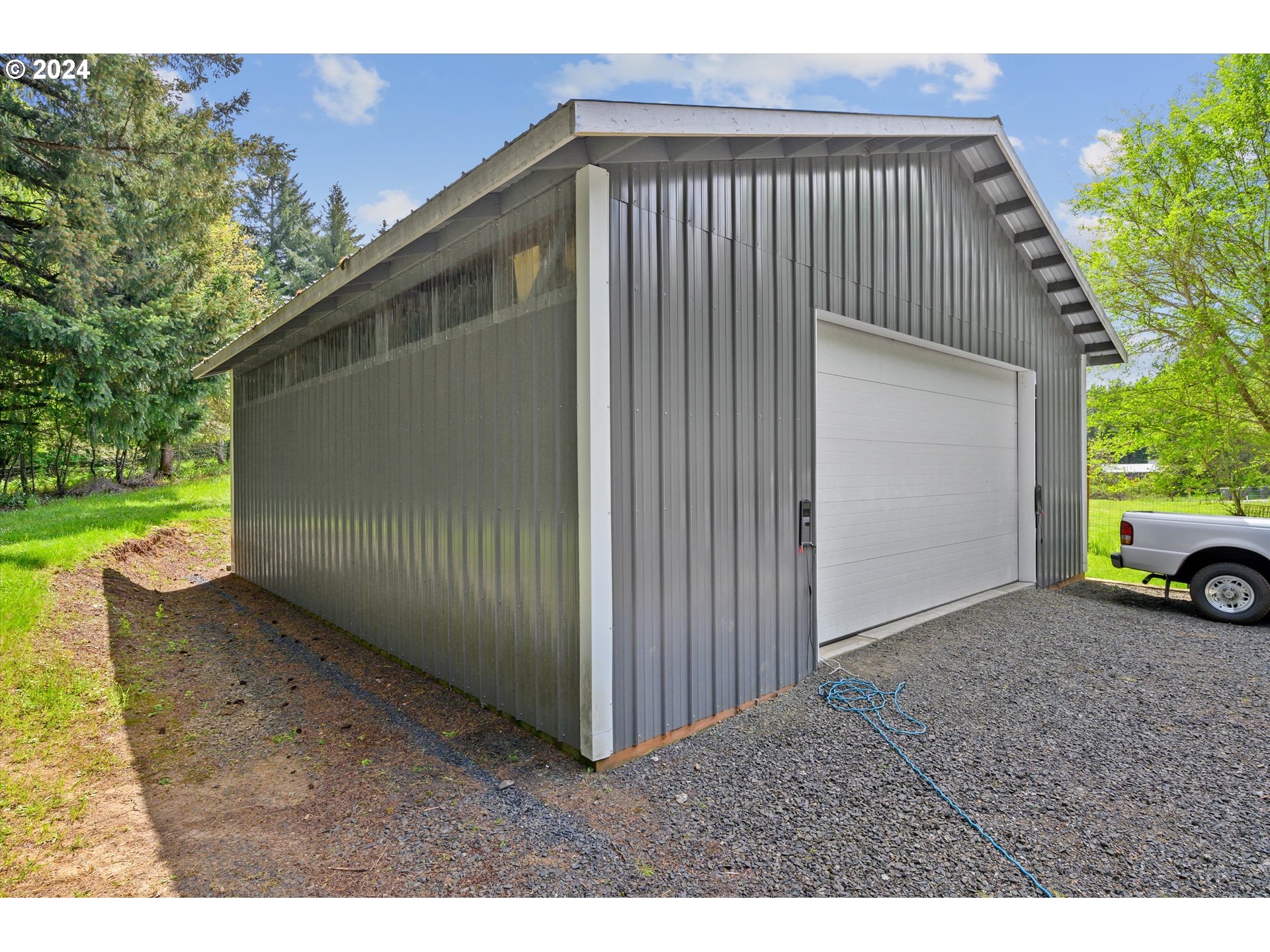 14885 Ferns Corner Road Dallas, OR 97338 - Photo 34 of 47 a view of a house with a yard