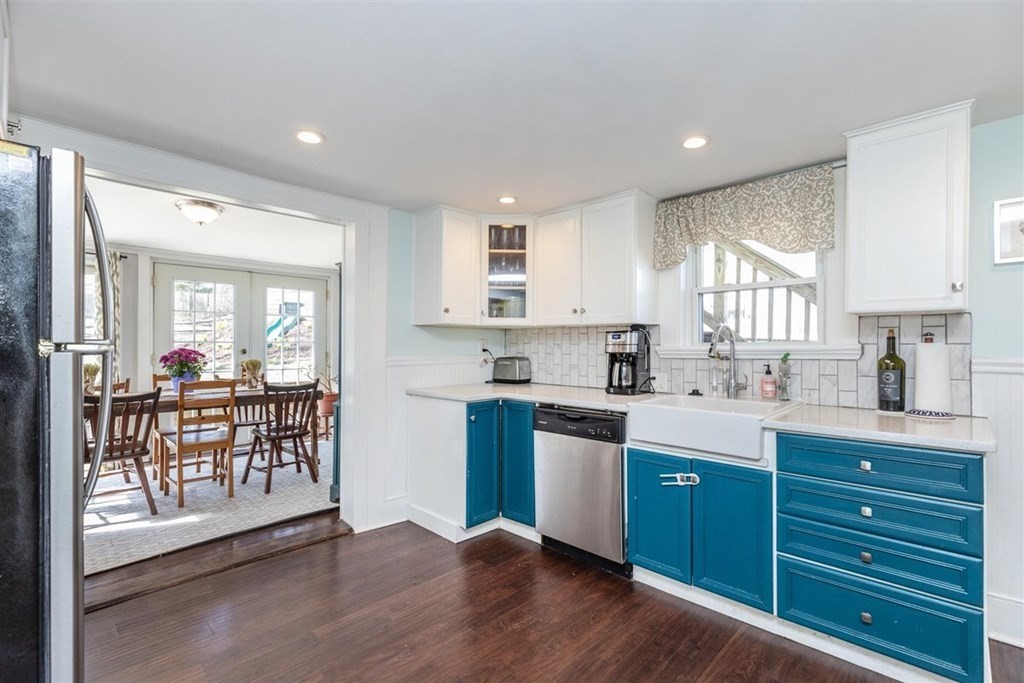 12 Linebrook Road Ipswich, MA 01938 - Photo 9 of 30 a kitchen with granite countertop a stove a sink and a refrigerator