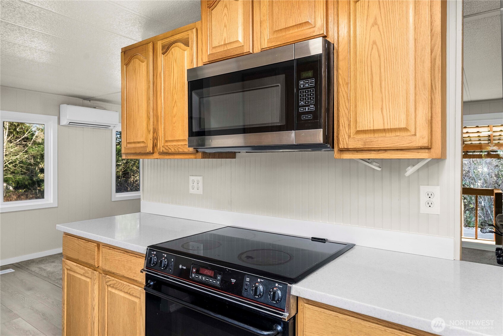 733 Tipsoo Loop South Rainier, WA 98576 - Photo 13 of 37 a kitchen with a stove and a microwave
