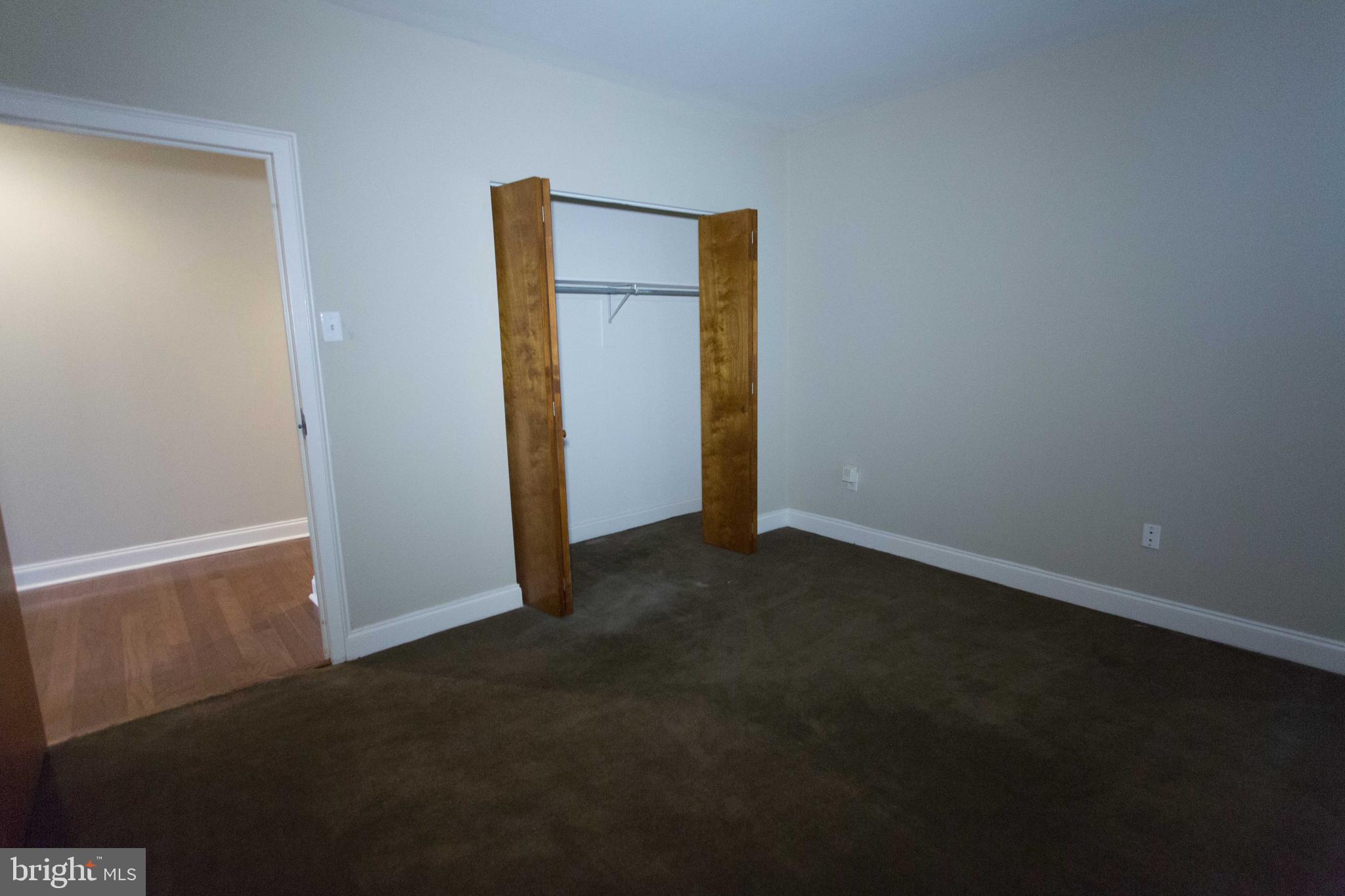 1411-5 Walnut Street, Unit 908 Philadelphia, PA 19102 - Photo 22 of 31 an empty room with closet area