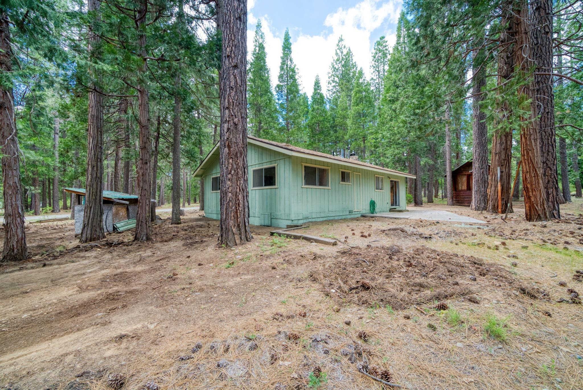 58374 Gill Ranch Road Cromberg, CA 96103 - Photo 13 of 44 a view of a house with a backyard