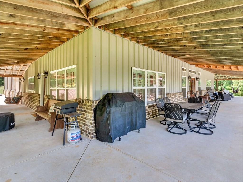 110 Wilson Road Jackson, GA 30233 - Photo 69 of 93 a living room with furniture and a large window