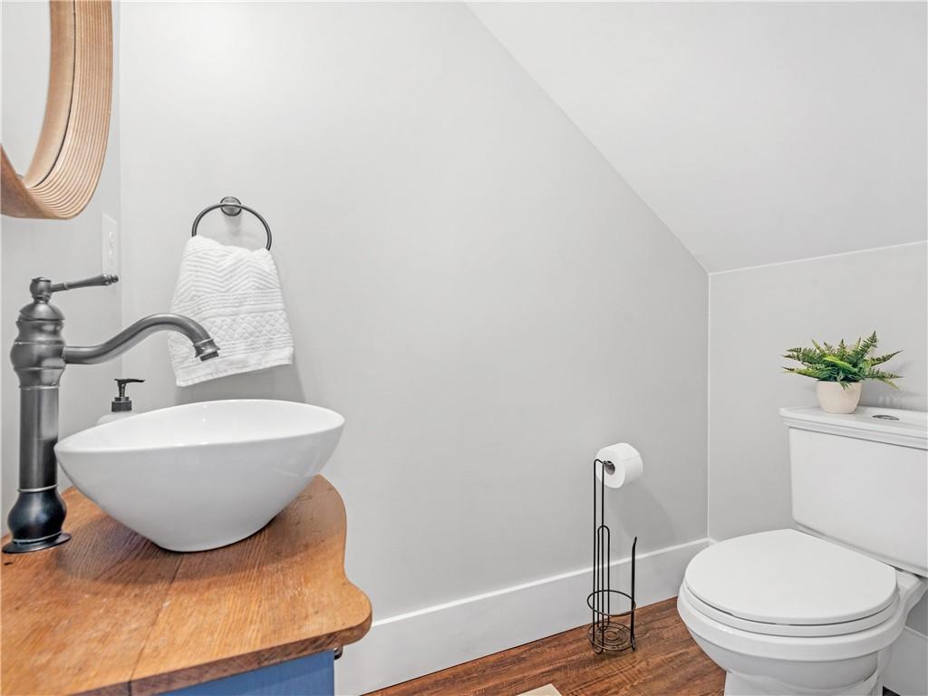110 Wilson Road Jackson, GA 30233 - Photo 10 of 93 a bathroom with a toilet sink and mirror