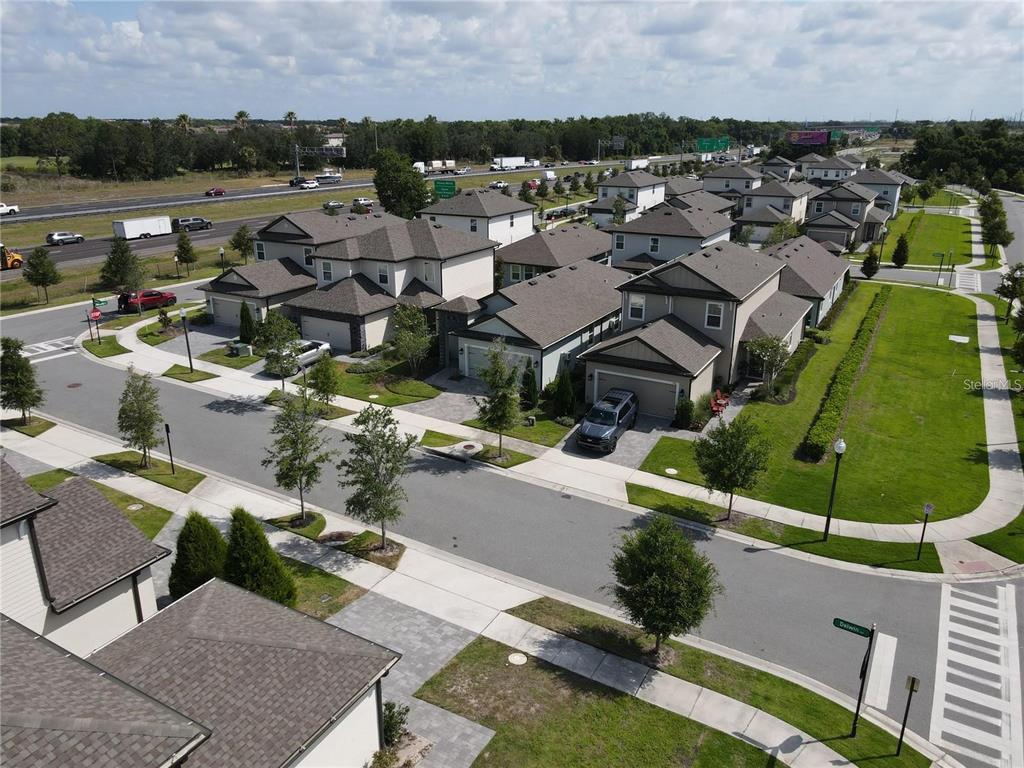 7955 Delwin Lane Reunion, FL 34747 - Photo 21 of 25 an aerial view of a city with lots of residential buildings