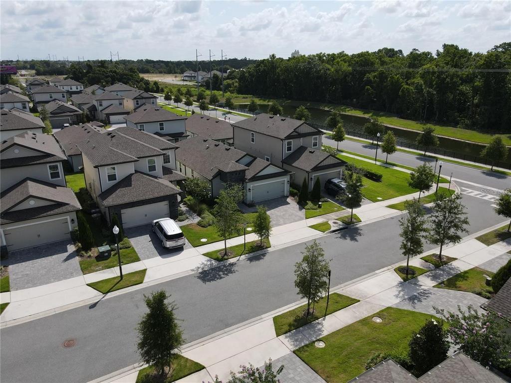 7955 Delwin Lane Reunion, FL 34747 - Photo 5 of 25 an aerial view of a house with garden space and street view