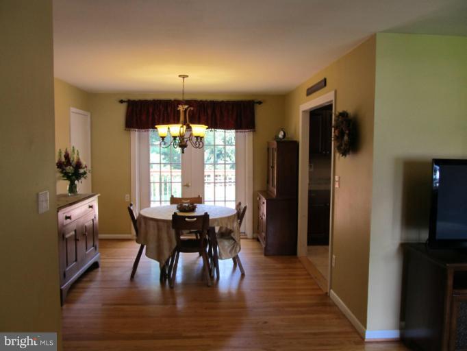 2504 Pleasantville Road Fallston, MD 21047 - Photo 1 of 30 a view of a dining room with furniture window and outside view