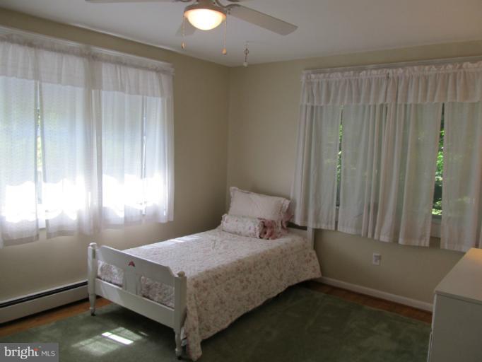 2504 Pleasantville Road Fallston, MD 21047 - Photo 2 of 30 a bedroom with a bed and window