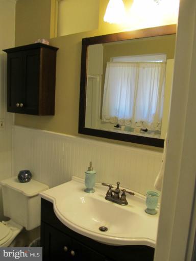 2504 Pleasantville Road Fallston, MD 21047 - Photo 11 of 30 a bathroom with a sink and a mirror