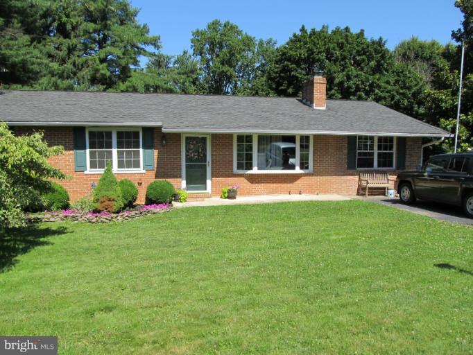 2504 Pleasantville Road Fallston, MD 21047 - Photo 12 of 30 a front view of house with yard and green space