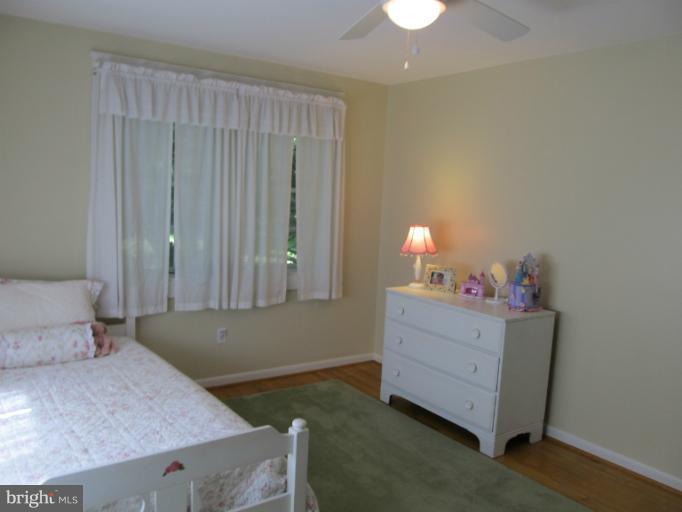 2504 Pleasantville Road Fallston, MD 21047 - Photo 13 of 30 a bedroom with a bed and a dresser