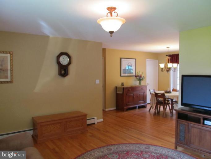 2504 Pleasantville Road Fallston, MD 21047 - Photo 14 of 30 a living room with furniture and a wooden floor