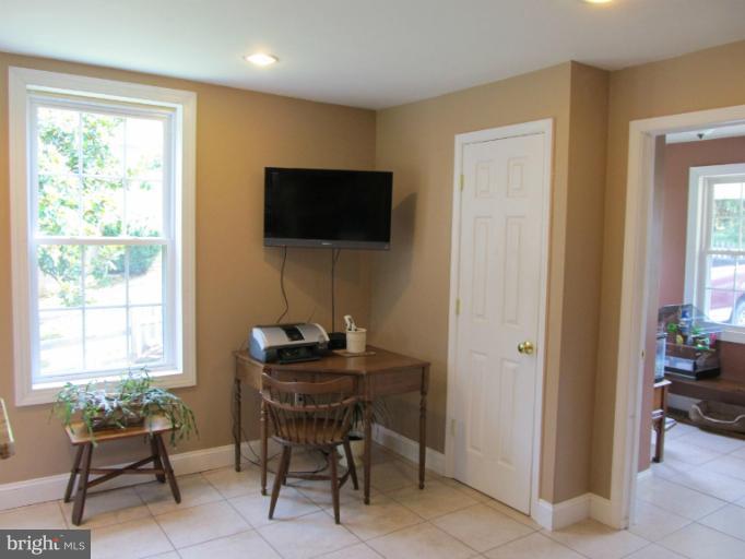 2504 Pleasantville Road Fallston, MD 21047 - Photo 26 of 30 a living room with furniture and a flat screen tv