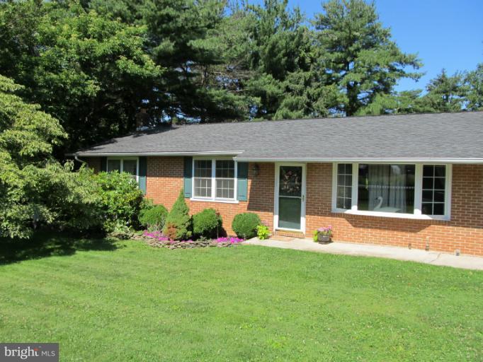 2504 Pleasantville Road Fallston, MD 21047 - Photo 30 of 30 a front view of a house with a yard and trees